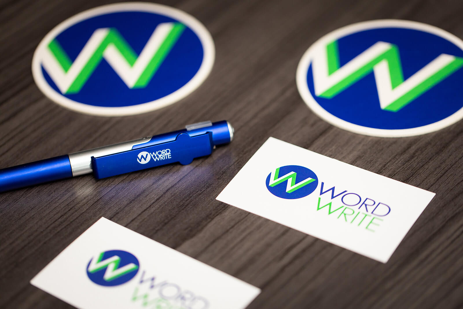 WordWrite coasters, pen, and business cards
